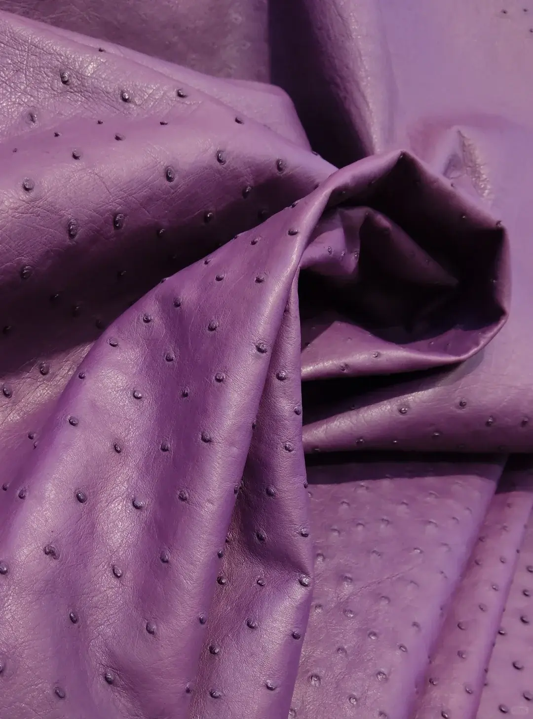 Purple South African ostrich leather with signature quill follicles